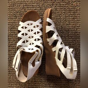 Strappy wedge sandal by Baretraps